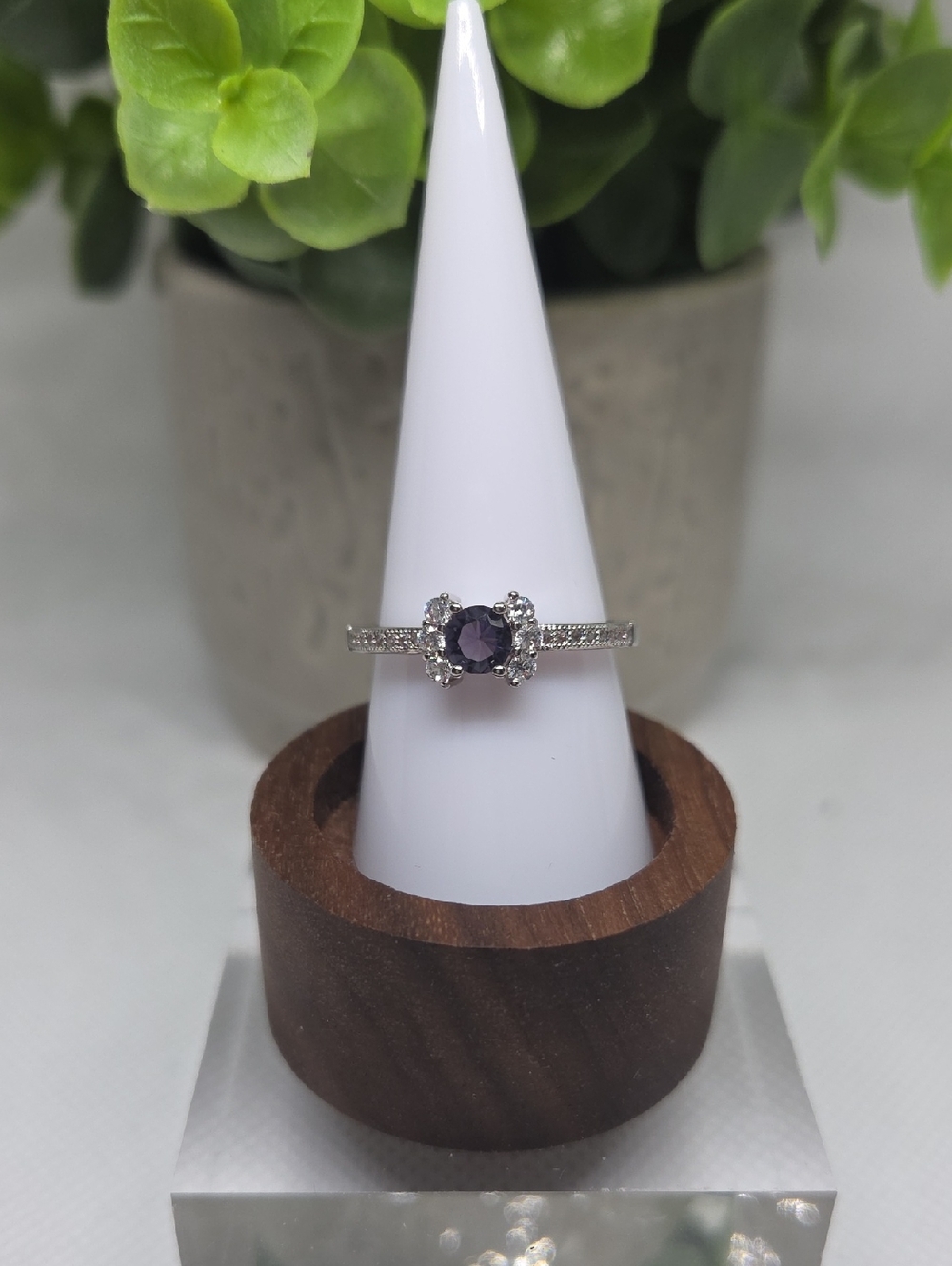 Silver Ring with Purple Center Stone and Accent Diamonds